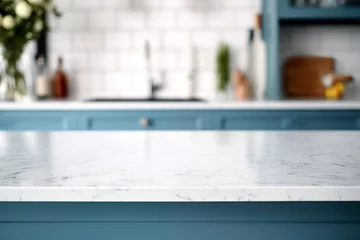 Poster Closeup of white marble countertop in modern kitchen blue with blurred background. High quality photo © oksa_studio