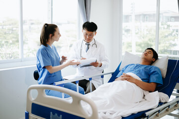 Doctors explaining the symptoms to a patient in hospital