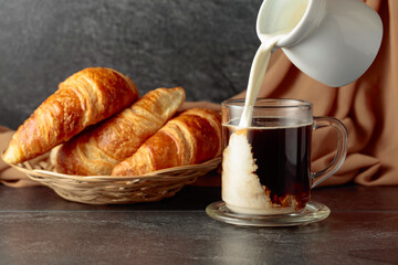Croissants and coffee with cream.