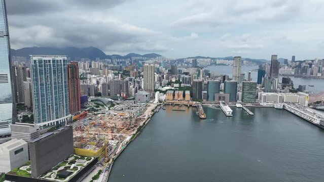 West Kowloon Cultural District, a Waterfront Promenade with Xiqu Centre Austin Jordan Tsim Sha Tsui Hong Kong High speed Railway Station Canton Road near Victoria Harbour, Aerial drone skyview