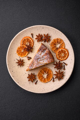 A piece of baked homemade pie with apple or pear, with cinnamon