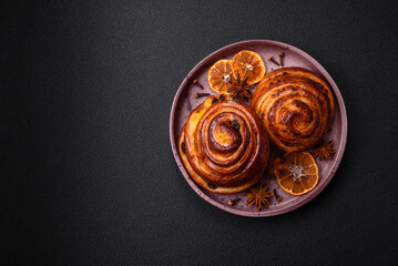 Delicious baked cinnamon raisin rolls in the form of rolls