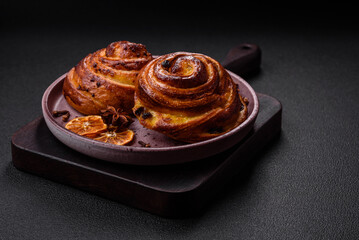 Delicious baked cinnamon raisin rolls in the form of rolls