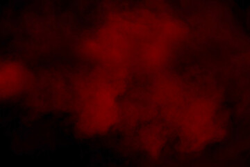 Orange and red steam on a black background.