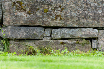 Large stones laid as a fence