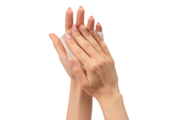 Wet wipe in a woman hand isolated on a white background.