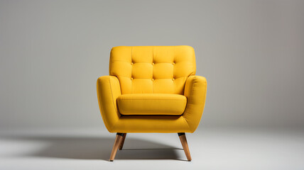 Yellow button tufted soft cushioned armchair on gray background. Interior design modern furniture concept. Banner with copy space