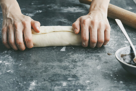 Step by step process of making cinnamon rolls dough at home. Holiday baking. High quality photo - Powered by Adobe