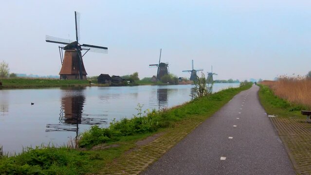 famous row of Dutch old-fashioned windmills in Kinderdijk the Netherlands