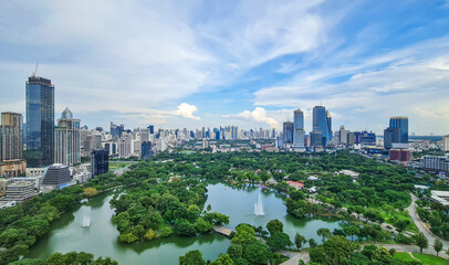 Lumpini park (Public park) and many building, view center of Bangkok City, Thailand.