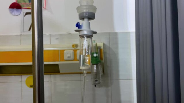 The sterile Baxter Infusion system drips fluid or medication at a medical institution.