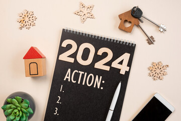 New Year Aims 2024. To Do List. Empty Notebook at the Desk with Decorative House Model. Top view. Creating Plan, Resolution. New Life, Start Up, Beginning. Business ideas. Goals, action, checklist