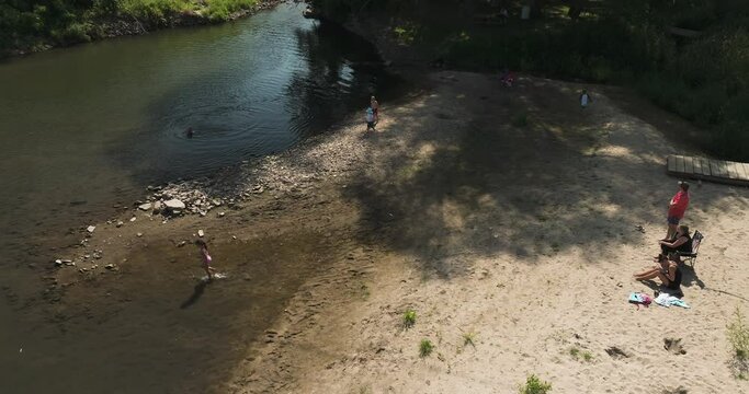 Tourists Relaxing By The River In Oronoco, Minnesota, USA - aerial shot