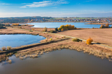 Aerial landscape of autumn lakes and forests in the Kociewie region, Poland.