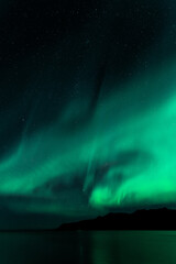 aurora borealis above the clouds