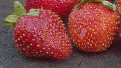 Ripe strawberries on a wooden board