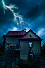 mysterious villa at night a storm with lightning in the sky