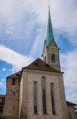Fototapeta na wymiar Fraumunster church on a sunny day with blue sky, canton of Zurich, Switzerland. A walk through the city on a sunny day
