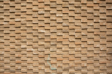 Photo of an old empty brick background for design. A red brick wall.