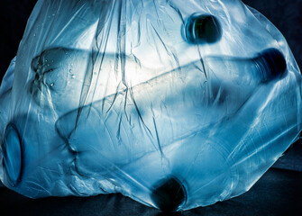 Waste separation: Detail of a bin liner with plastic bottles