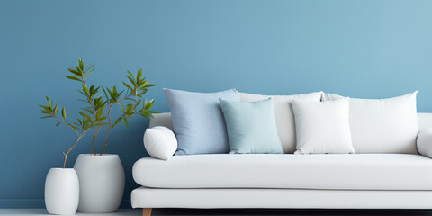 White modern upholstered cushioned sofa with blue wall art - obrazy, fototapety, plakaty