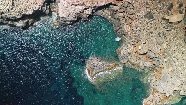 Aerial Loop of the seashore coast waves and cliffs. Background from the Mallorca.