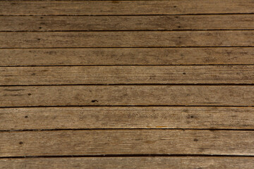 Fototapeta premium Old wood texture background, surface with old natural colored wood, top view. Grain table surface.