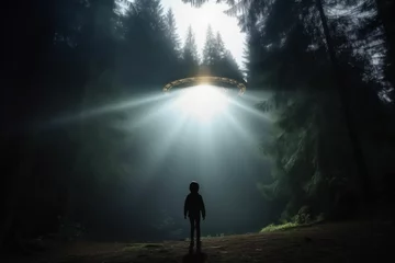 Tuinposter UFO Mysterious UFO Abduction of a Child in a Dense Forest, Mid-Abduction Scene
