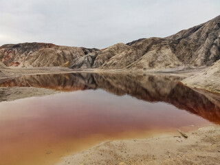 Ural Mars. An extraordinarily beautiful summer landscape with red lakes, colorful slopes and...