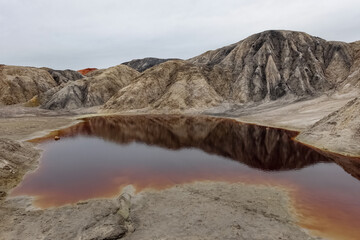 Ural Mars. An extraordinarily beautiful summer landscape with red lakes, colorful slopes and...