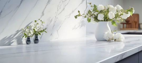 Rolgordijnen A contemporary kitchen interior featuring sleek white marble countertops and a modern design. © EdNurg