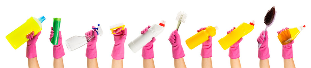 Hand with  rubber glove holding cleaning products isolated on white background. banner. Cleaning...