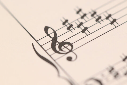 Treble clef on Partiture music sheet. G-key score