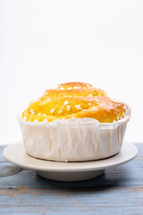 one saffron bun pastry on plate white background