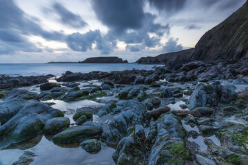 Marloes Sands, Pembrokeshire, Wales at dusk with cloud and looking moody at high tide