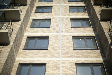 Windows in building. New building in city.