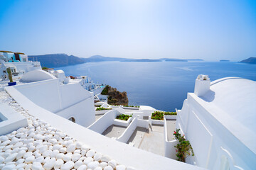 traditional greek stairs in village Oia of Santorini typical scenery - obrazy, fototapety, plakaty
