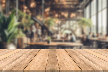 Empty wooden table space platform and blurred restaurant or coffee shop background for product display montage