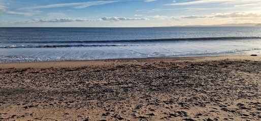 Stunning view of Exmouth Beach in England, showcasing its sandy shoreline and crystal blue waters