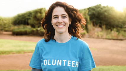 Young volunteer working for activist community project outdoors - Donations, environmental and...
