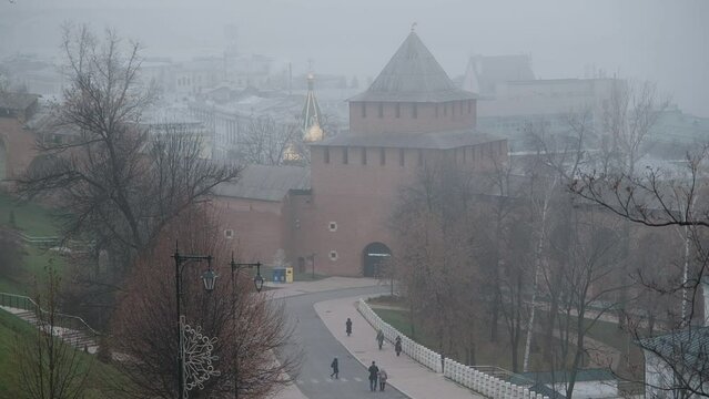 Ivanovskaya tower of the Nizhny Novgorod Kremlin in the thick November fog