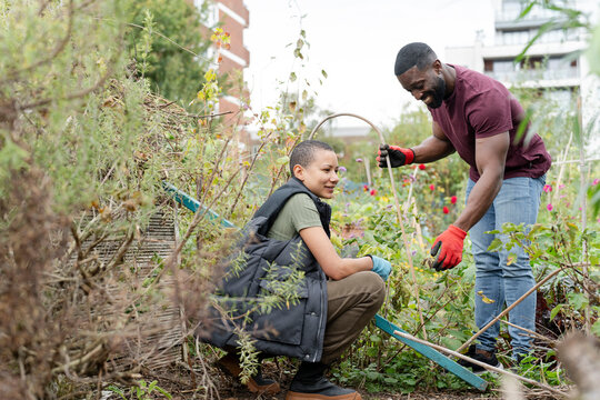 Couple working in urban garden