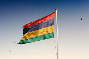Mauritius flag fluttering in the wind on sky.