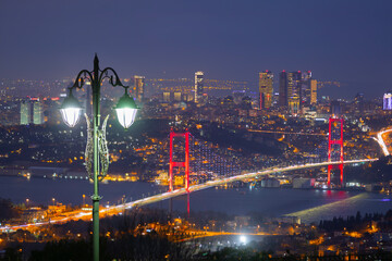 View of Istanbul from the July 15 Martyrs Bridge with a stylish street lamp.