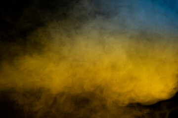 Yellow steam on a black background.