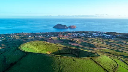 Fototapeten Drone shot of the ancient Pico Dona Joana volcano on the Portuguese island of Terceira in the Azores © Foto-Jagla.de