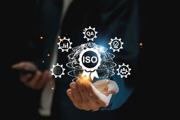 Businessman ISO symbol showing quality assurance on virtual screen
