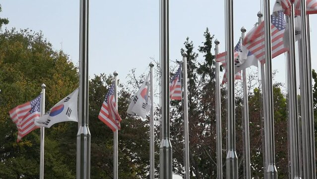 Flags at the monument at the DMZ in South Korea, thanking the United States for its leading role in the Korean War (1950-1953)
