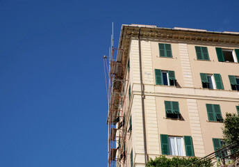 Scaffolding on the facade of a building - 675919582