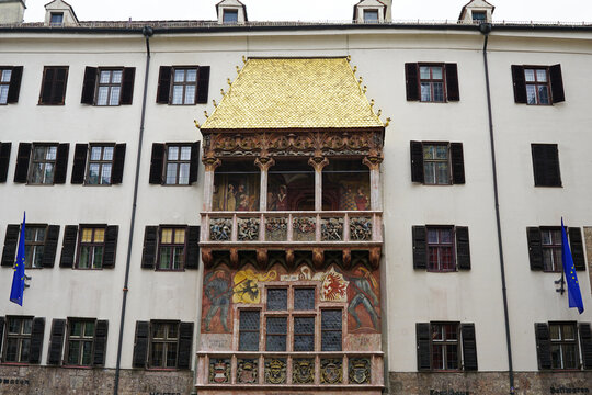 Exterior architecture and design of The Goldenes Dachl (Golden Roof), landmark structure located in Altstadt old town section decorated with fire-gilded copper tiles- Innsbruck, Austria